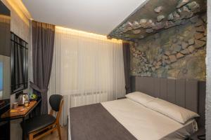 Postel nebo postele na pokoji v ubytování Continental Airport Hotel