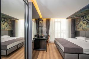 Postel nebo postele na pokoji v ubytování Continental Airport Hotel