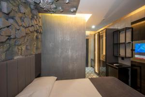Postel nebo postele na pokoji v ubytování Continental Airport Hotel