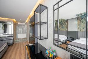 Postel nebo postele na pokoji v ubytování Continental Airport Hotel