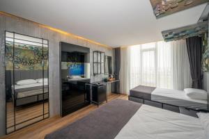 Postel nebo postele na pokoji v ubytování Continental Airport Hotel