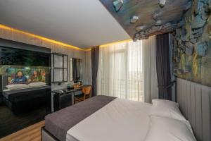 Postel nebo postele na pokoji v ubytování Continental Airport Hotel