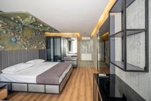 Postel nebo postele na pokoji v ubytování Continental Airport Hotel