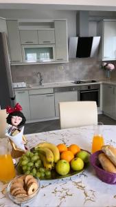 Kuchyň nebo kuchyňský kout v ubytování Apartments Mihi
