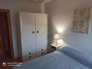 Łóżko lub łóżka w pokoju w obiekcie Amura Motril. Apartamento con garaje