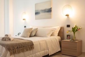 Кровать или кровати в номере La casa dell'arte