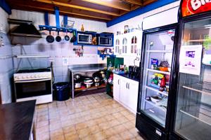 A kitchen or kitchenette at Gecko Hostel