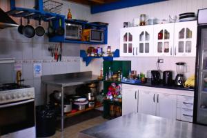 A kitchen or kitchenette at Gecko Hostel