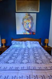 A bed or beds in a room at Gecko Hostel