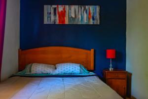 A bed or beds in a room at Gecko Hostel