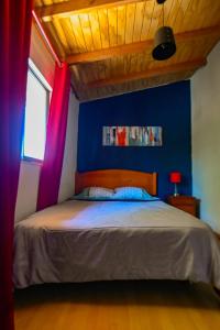 A bed or beds in a room at Gecko Hostel