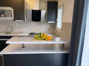 Kuchyň nebo kuchyňský kout v ubytování Apartments Mihi