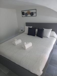 Posteľ alebo postele v izbe v ubytovaní Maya's Home