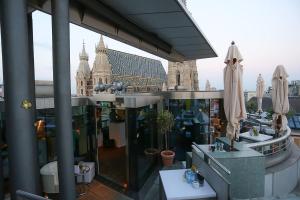 a view of a building from a balcony at DO&CO Hotel Vienna in Vienna