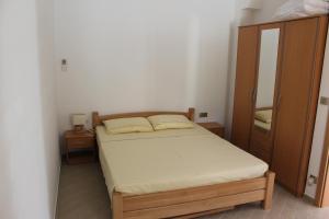 Кровать или кровати в номере Apartments Villa Eva