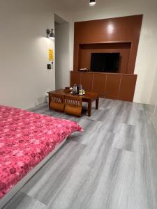 TV a/nebo společenská místnost v ubytování Nantou Xitou Riverside Homestay B&B