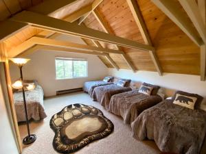 a room with four beds in a attic at Bearvista in Arnold +61 photos