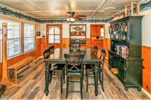 a dining room with a table and chairs at Frank's Old Bear-149 by Big Bear Vacations in Big Bear Lake