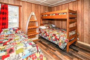a bedroom with two bunk beds and a bed at Frank's Old Bear-149 by Big Bear Vacations in Big Bear Lake