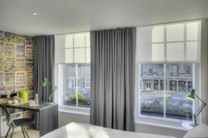 Voodi või voodid majutusasutuse Grassmarket Hotel toas