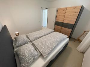 Ein Bett oder Betten in einem Zimmer der Unterkunft Casa San Remo - Objekt 5000