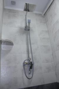 Koupelna v ubytování Viva Hotel