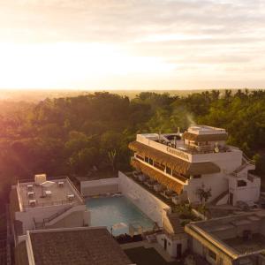 an aerial view of a building with a swimming pool at Bohol Coastal View Hotel in Taiwala