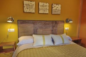 A bed or beds in a room at Infanta Isabel