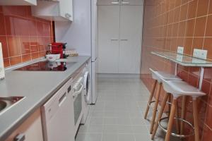 A kitchen or kitchenette at Infanta Isabel