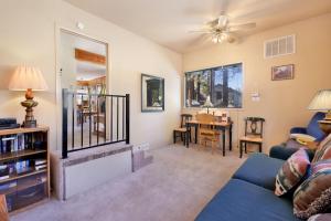 a living room with a couch and a table at Jus' Restin-265 by Big Bear Vacations in Big Bear Lake