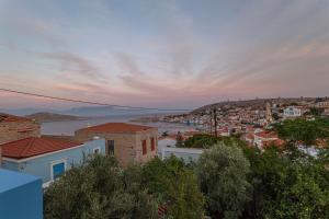 a view of a city with a river and buildings at Althea Apartments 1 in Halki