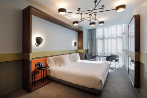 Cama o camas de una habitación en Marquis Hotels Issabel's