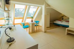 Postel nebo postele na pokoji v ubytování Paula Wellness & SPA