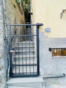 an entrance to a building with a gate at I colori di Rio in Riomaggiore