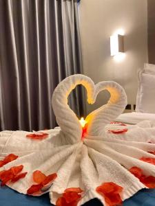 Een bed of bedden in een kamer bij Bravo Tanauan Hotel