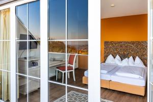Postel nebo postele na pokoji v ubytování Landhotel GUT MOSER