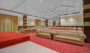 Letto o letti in una camera di Treebo Premium Median Inn