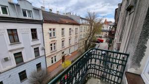 a view from a balcony of a city with buildings at Florian Apartment 8 in Krakow