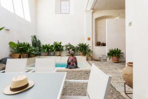 Istumisnurk majutusasutuses Eva Recommends Sanlúcar City & Pool