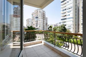 a balcony with a view of a city at Marvida Happy Suites in Antalya