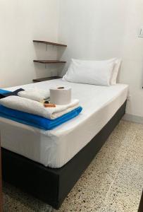 Cama o camas de una habitación en Roomies House By Rincon