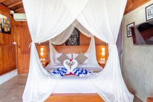 Postel nebo postele na pokoji v ubytování Japa Guesthouse