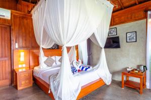 Postel nebo postele na pokoji v ubytování Japa Guesthouse + 37 fotografií