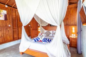 Postel nebo postele na pokoji v ubytování Japa Guesthouse