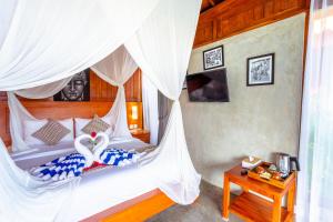 Postel nebo postele na pokoji v ubytování Japa Guesthouse