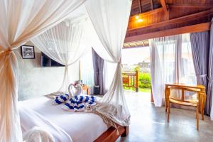 Postel nebo postele na pokoji v ubytování Japa Guesthouse