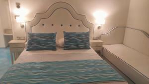 Cama o camas de una habitación en Albergo S. Andrea