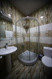 Vannituba majutusasutuses Discovery Hotel