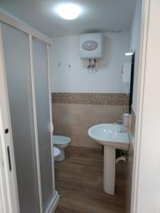 Et badeværelse på IGIEA ROOMS