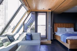 Rúm í herbergi á Asakusa Kokono Club Hotel